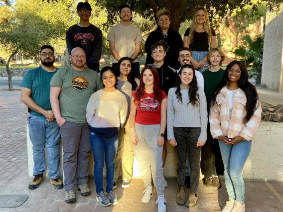 Group of IESTE students standing under a tree